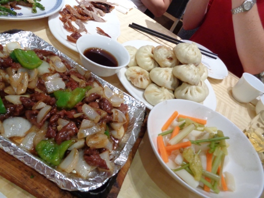 A delicious spread from the duck restaurant. Look at those savory buns!